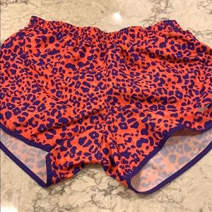 Nike running shorts orange and purple cheetah S